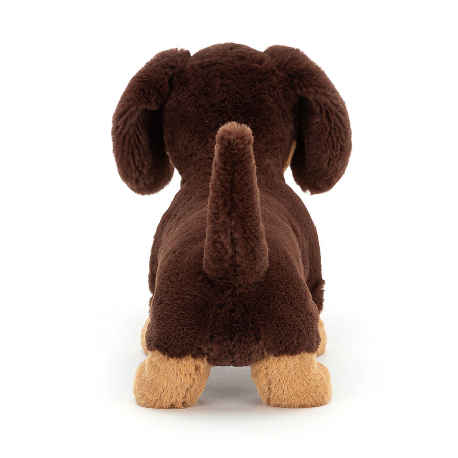Jellycat Otto Sausage Dog detalj – nærbilde av broderte øyne og myk pels